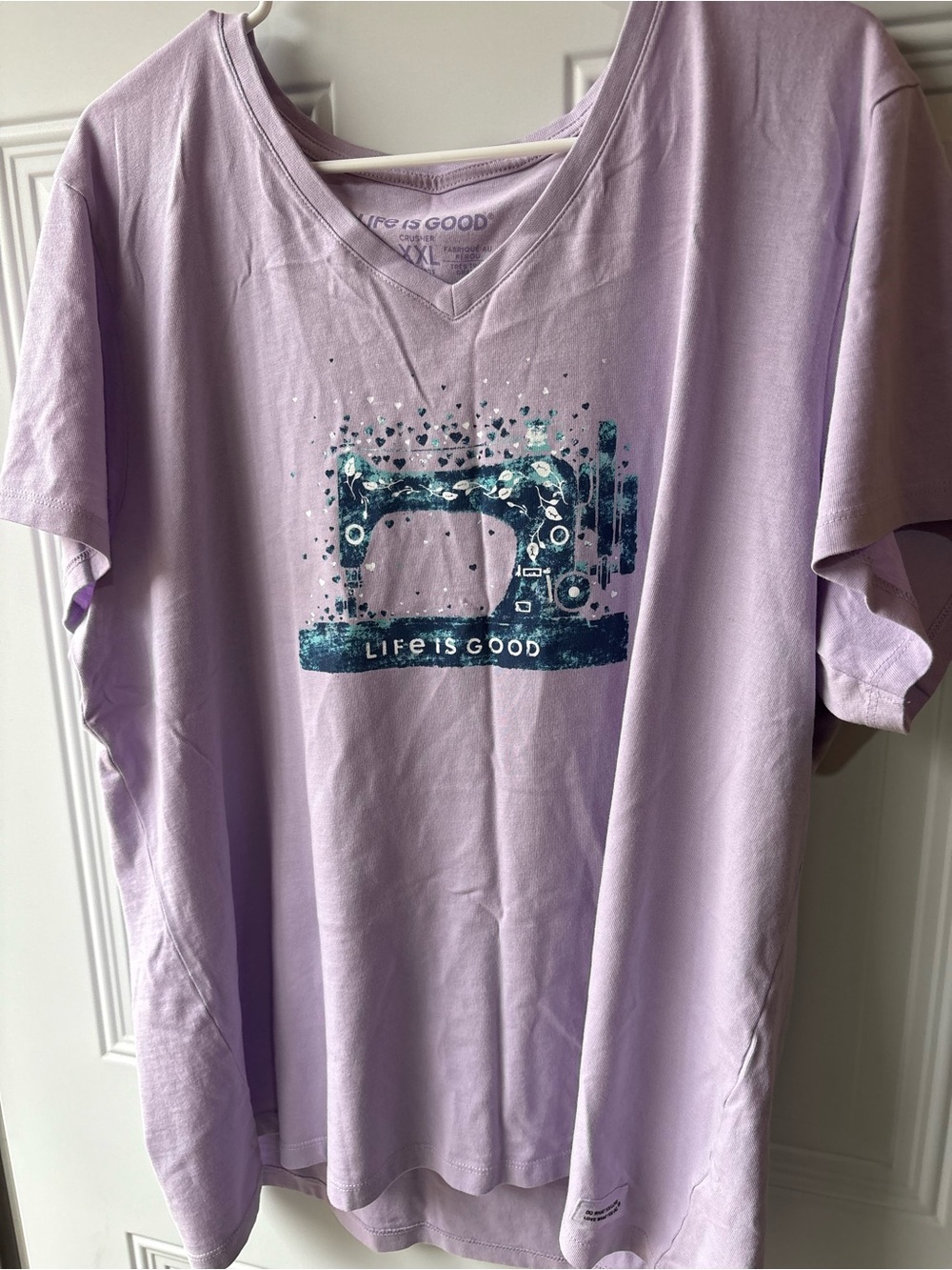 Life Is Good Lavender V‑Neck Tee with Teal Sewing Machine Graphic